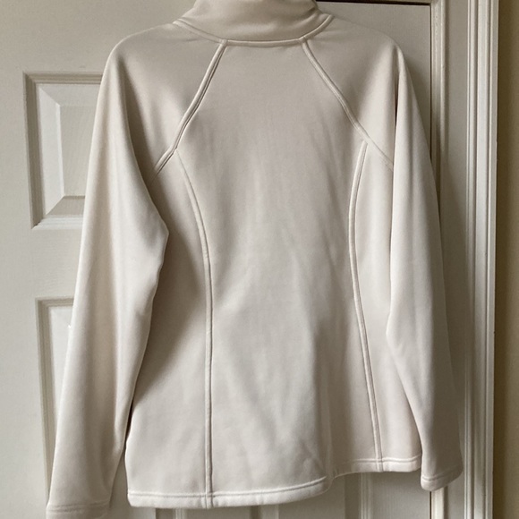 The north face cream color zip up jacket with front side pockets. 27 inches long - Picture 5 of 6